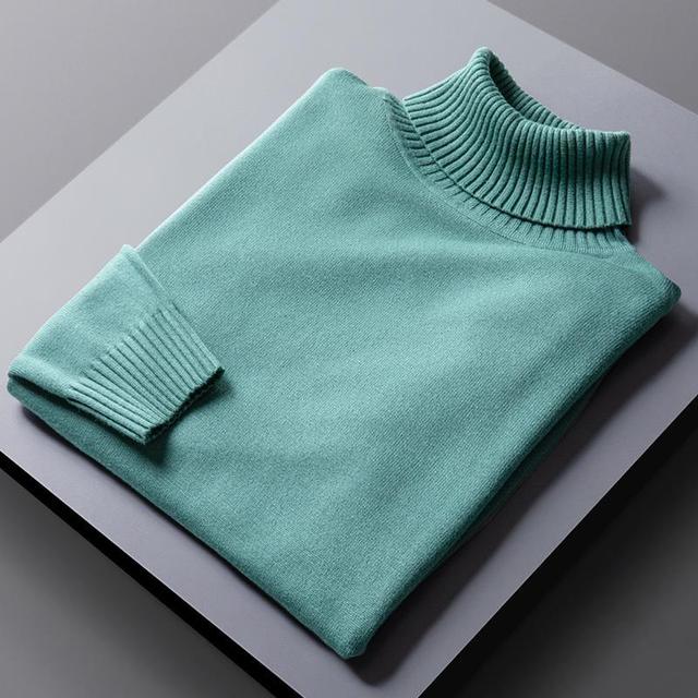 "Lyxig polotröja i mjukt premiummaterial, tidlös design, flera färger såsom grå, svart och vit för mångsidig stil."