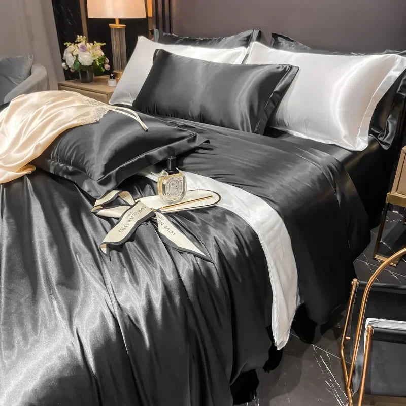 "Lyxigt silkebäddsset med elegant glans och mjuk textur, perfekt för komfort och stil i ditt sovrum."