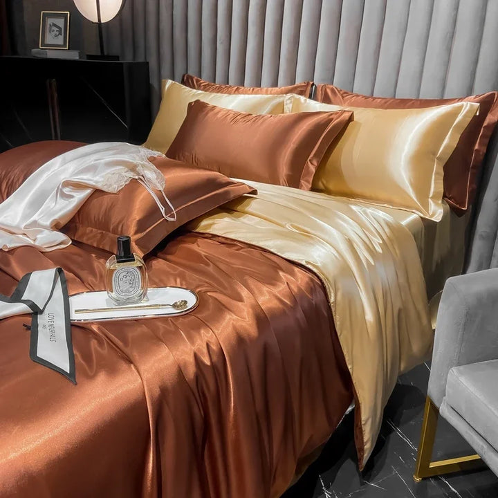 "Lyxigt silkebäddsset med elegant glans och mjuk textur, perfekt för komfort och stil i ditt sovrum."