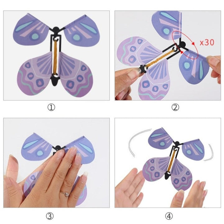 Detaljbild av fjärilens mekanism, hur den upprullade designen skapar den fladdrande effekten, lekfull.