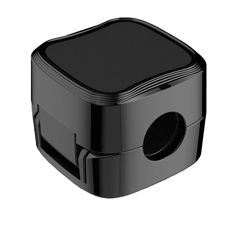 "Magnetisk kabelhållare håller kablar organiserade, stilren design i svart och vit, passar kablar upp till 7 mm."