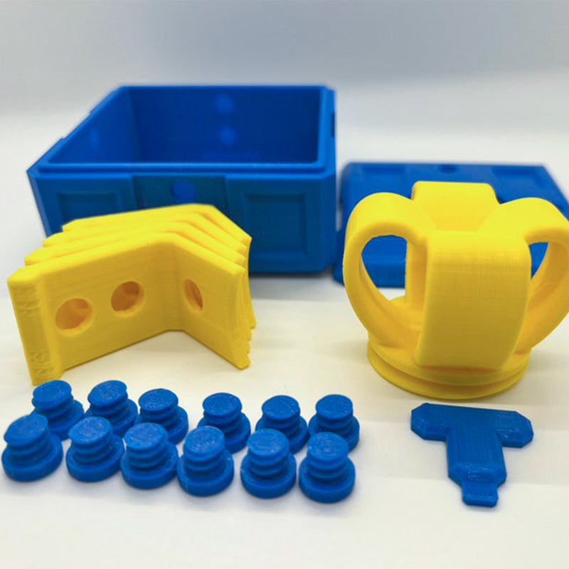 "Mångfärgad presentbox med mystisk design, 3D-utskriven med utmanande dolda nycklar och skruvbara bultar för spänning."