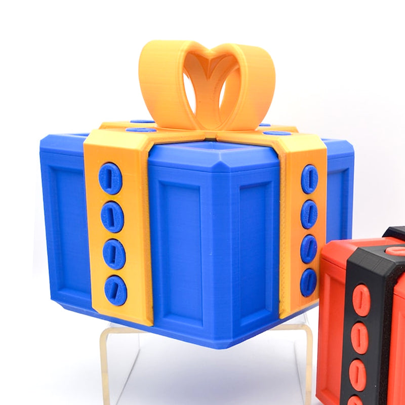 "Mångfärgad presentbox med mystisk design, 3D-utskriven med utmanande dolda nycklar och skruvbara bultar för spänning."