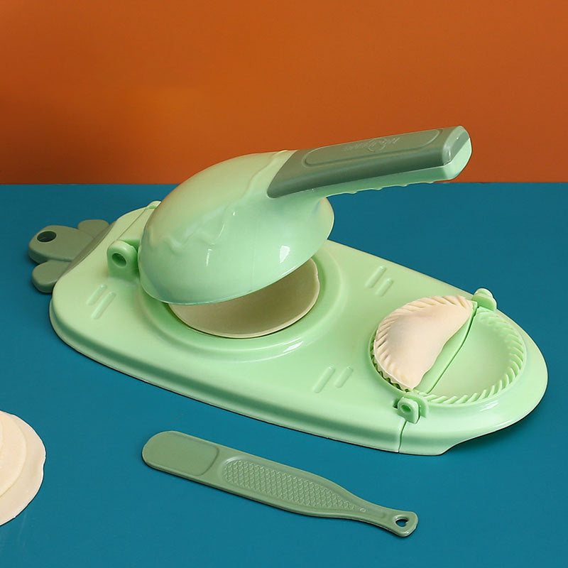 Mångsidig dumplingform i grön, gul, orange och rosa med ergonomiskt handtag för enkel matlagning i köket.