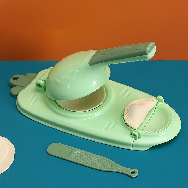 Mångsidig dumplingform i grön, gul, orange och rosa med ergonomiskt handtag för enkel matlagning i köket.