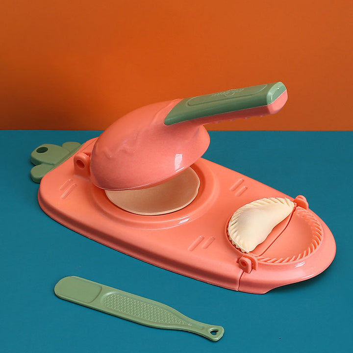 Mångsidig dumplingform i grön, gul, orange och rosa med ergonomiskt handtag för enkel matlagning i köket.