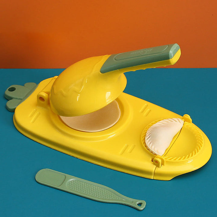 Mångsidig dumplingform i grön, gul, orange och rosa med ergonomiskt handtag för enkel matlagning i köket.