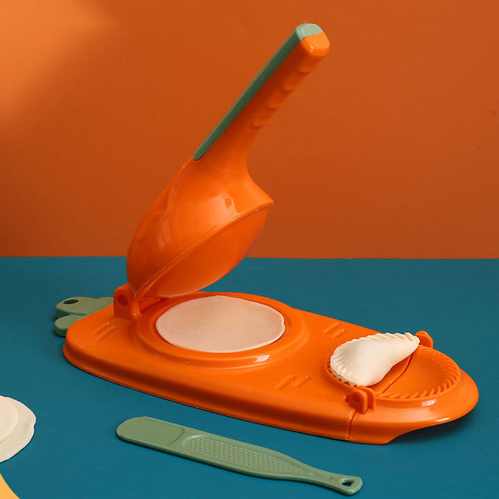 Mångsidig dumplingform i grön, gul, orange och rosa med ergonomiskt handtag för enkel matlagning i köket.