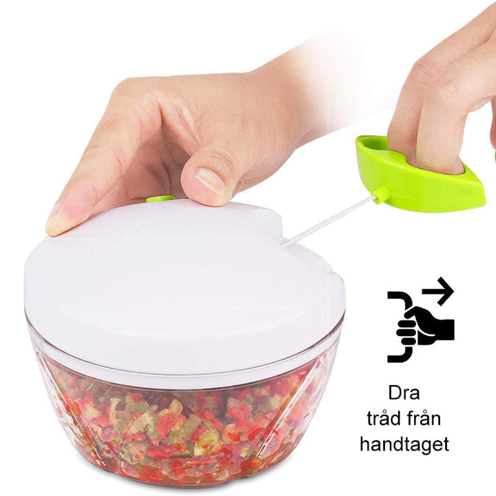 "Manuell lökhackare i rostfritt stål med ergonomiskt grepp, kompakt design och högkvalitativa blad, idealisk för köket."