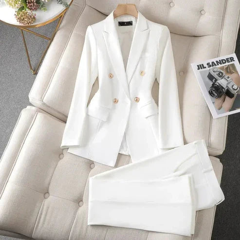 "Marinblå och vit slagkavaj med byxor set för dam, elegant och tidlös outfit för alla tillfällen"