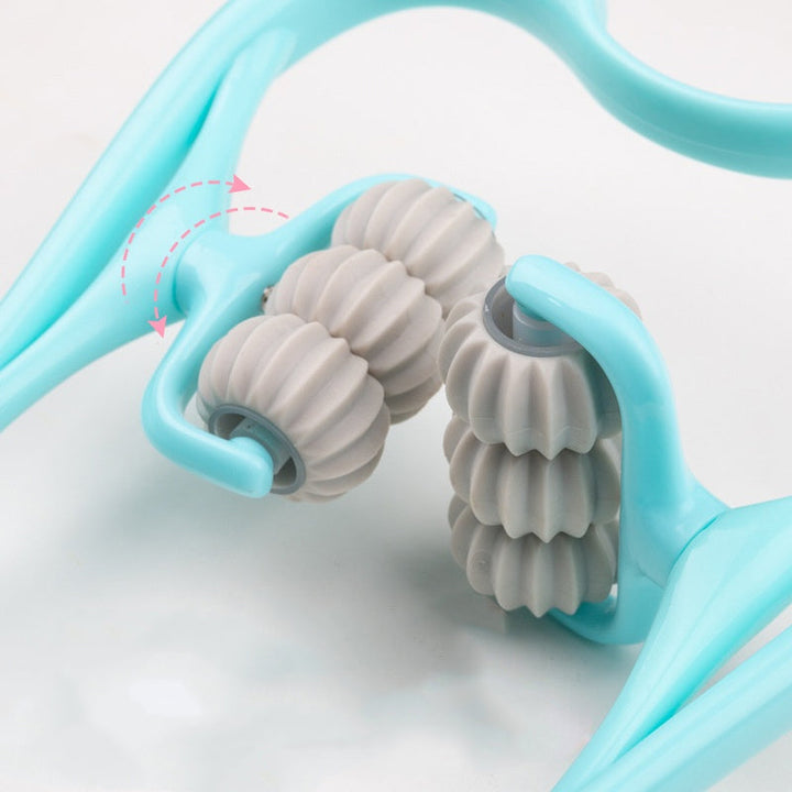 "Massageapparat för hals och axlar i blå/rosa, ergonomisk svanform, för avslappning och välbefinnande."