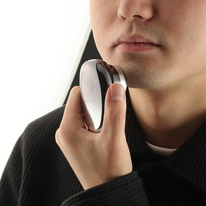 "Mini bärbar rakapparat i elegant design för män och kvinnor, kompakt och kraftig med 15 roterande blad."