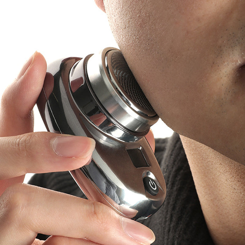 "Mini bärbar rakapparat i elegant design för män och kvinnor, kompakt och kraftig med 15 roterande blad."