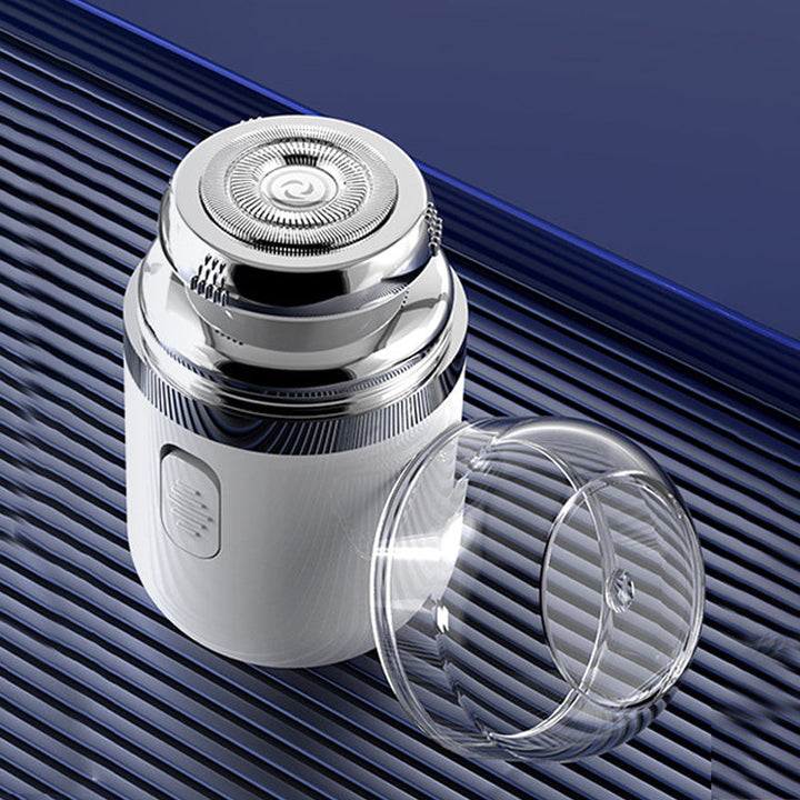 "Mini bärbar rakapparat med elegant design, kompakt storlek, dubbla ringblad och batteridriven funktion för både män & kvinno
