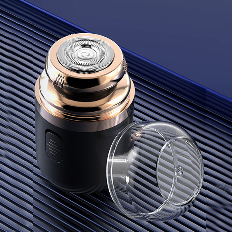 "Mini bärbar rakapparat med elegant design, kompakt storlek, dubbla ringblad och batteridriven funktion för både män & kvinno