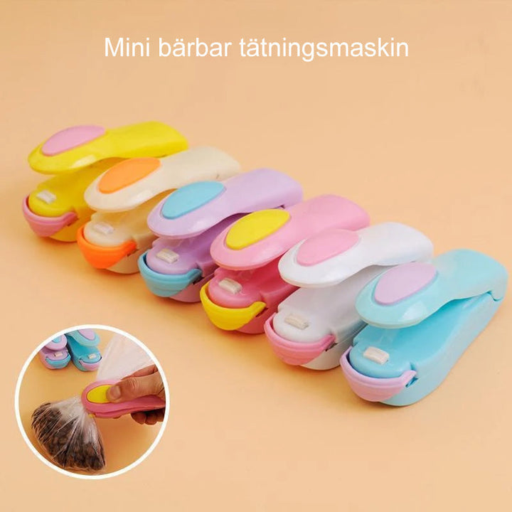"Mini bärbar värmeförsegling för hushåll, blå, rosa, grön, gul, kompakt, magnetisk bas, matbevarande, enkel att använda."