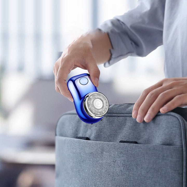 "Mini elektrisk rakapparat med smart digital display och kompakt design för effektiv herrrakning."