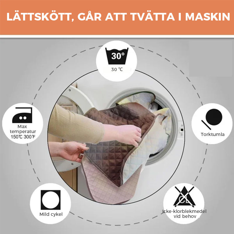 "Mjukt vilstolsöverdrag i grått polyester/fleece som skyddar och omvandlar fåtöljen till en inbjudande viloplats."