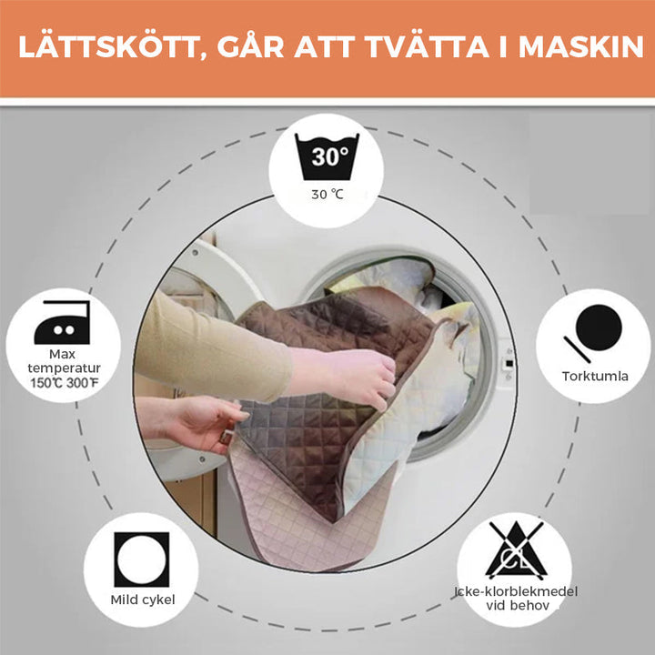 "Mjukt vilstolsöverdrag i grått polyester/fleece som skyddar och omvandlar fåtöljen till en inbjudande viloplats."
