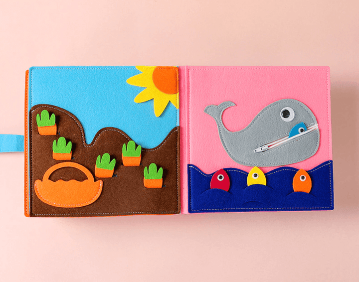 Hållbar och mjuk tygaktivitetsbok, säker för barn att leka med och utforska.