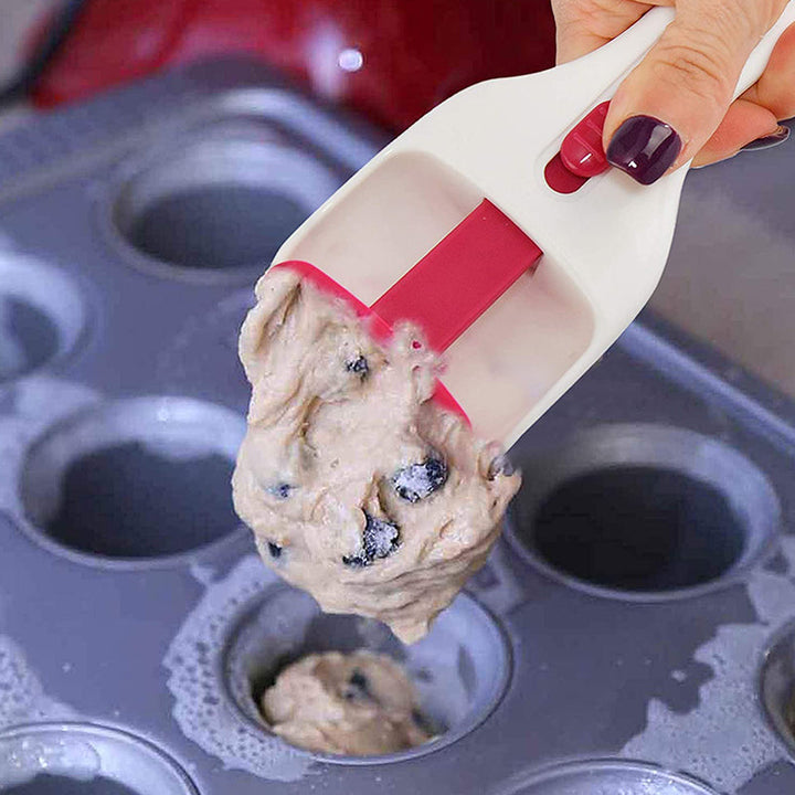 Muffin-skopa i silikon, ergonomisk design för exakt smetdosering utan spill, perfekt för muffins och cupcakes.