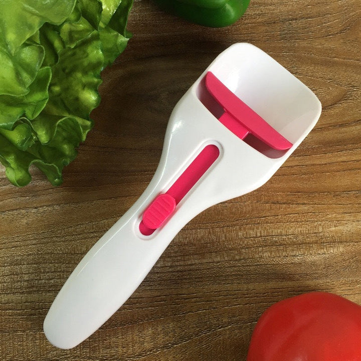 Muffin-skopa i silikon, ergonomisk design för exakt smetdosering utan spill, perfekt för muffins och cupcakes.