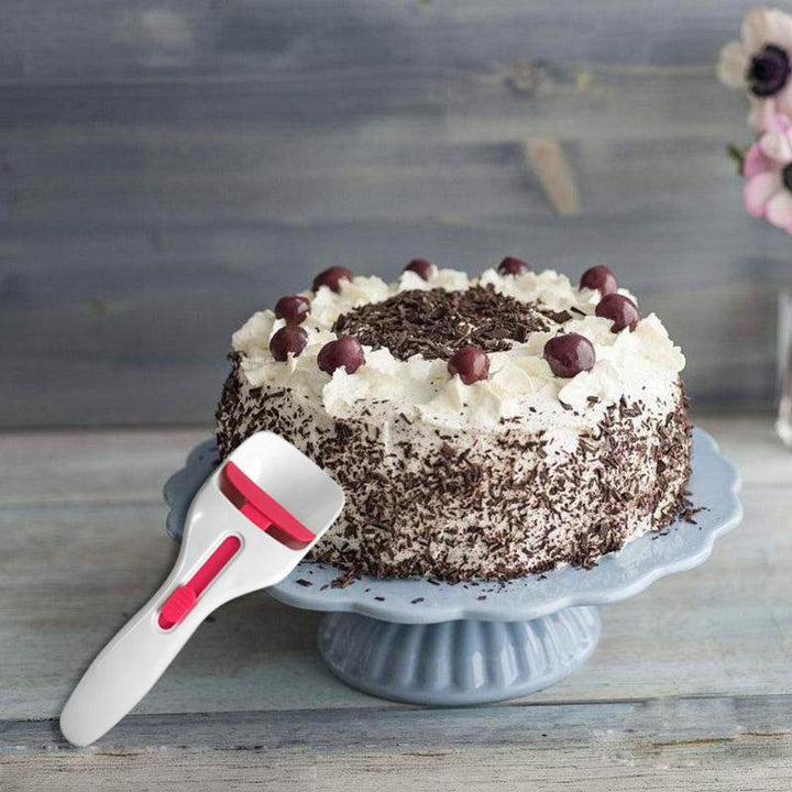 Muffin-skopa i silikon, ergonomisk design för exakt smetdosering utan spill, perfekt för muffins och cupcakes.