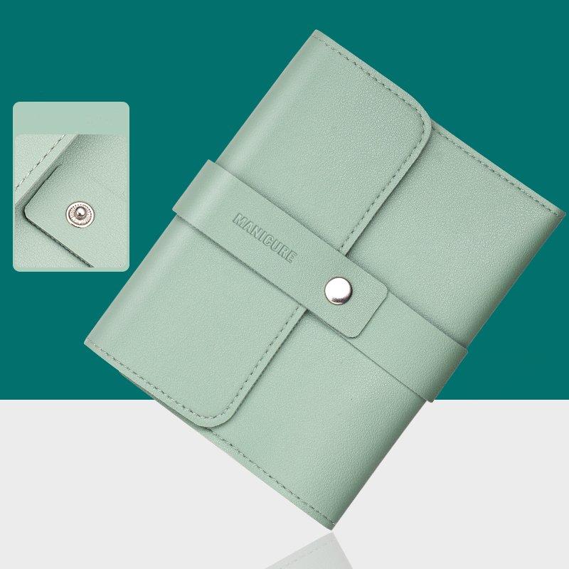 "Multifunktionell bärbar nagelklippare set i rostfritt stål, i gul, rosa, grön och blå, med elegant PU-läderfodral."