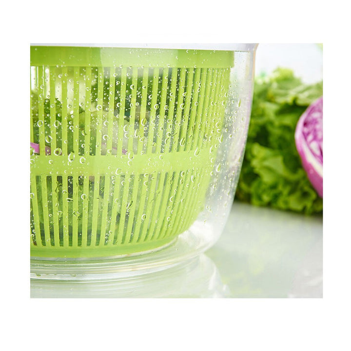"Multifunktionell grönsaksspinnare, BPA-fri, 5L kapacitet, elegant design, i plast, perfekt för sallad och köksanvändning."