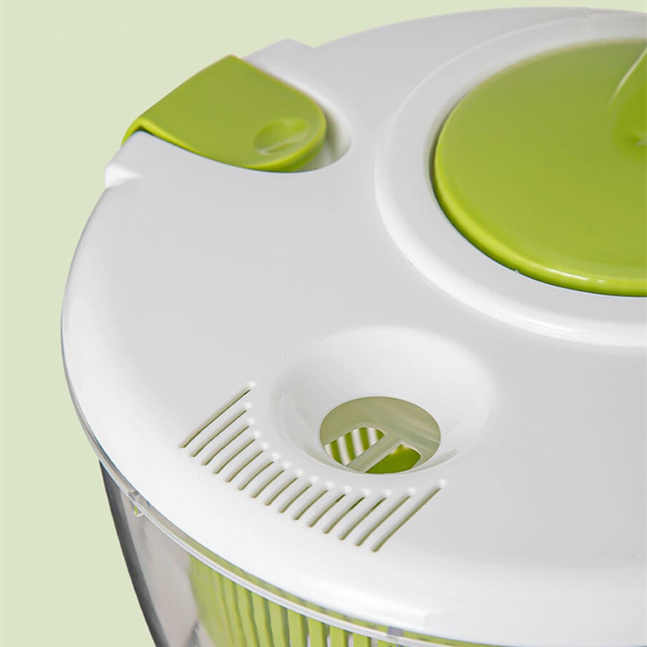 "Multifunktionell grönsaksspinnare, BPA-fri, 5L kapacitet, elegant design, i plast, perfekt för sallad och köksanvändning."