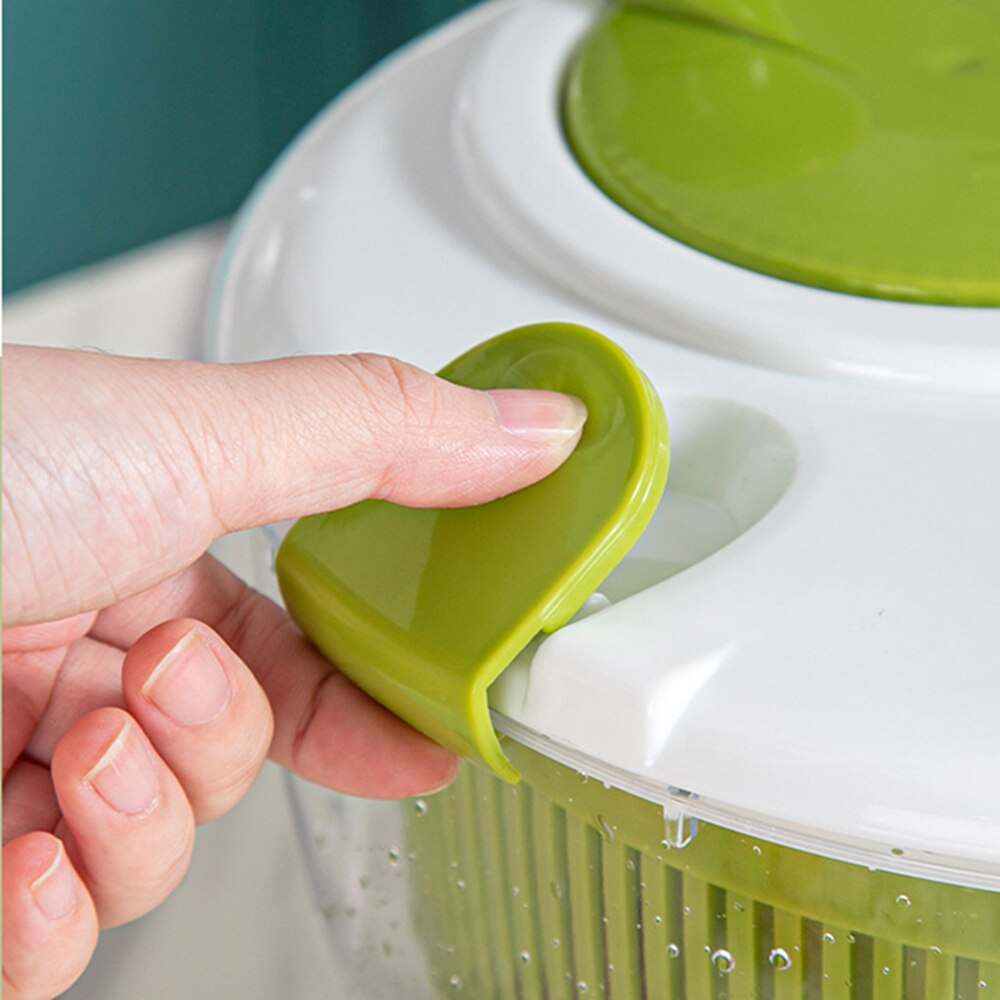 "Multifunktionell grönsaksspinnare, BPA-fri, 5L kapacitet, elegant design, i plast, perfekt för sallad och köksanvändning."