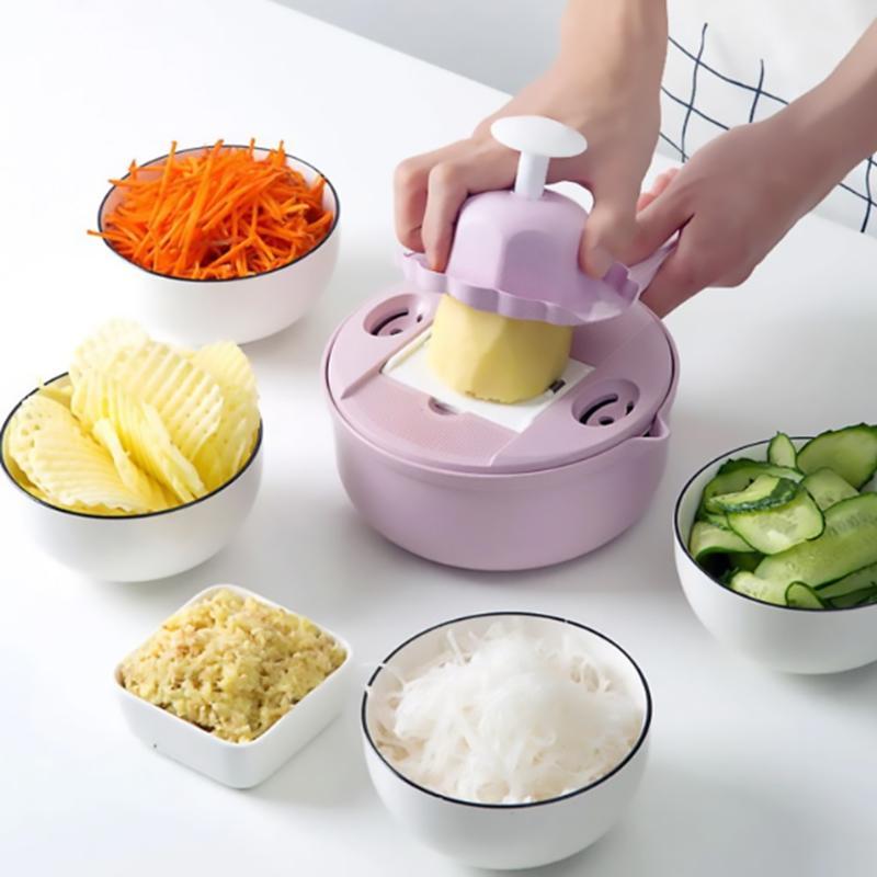 "Multifunktionell hackare i rostfritt stål med säker design för köket, skivar, hackar och river grönsaker enkelt."