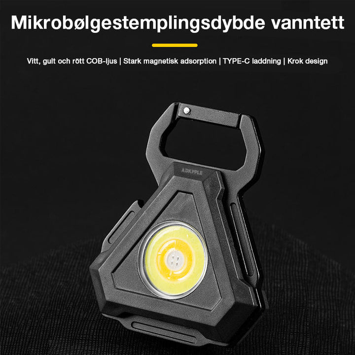 Multifunktionell LED-nyckellampa med stark magnet och krok, kompakt design, bärbar och perfekt för utomhusbruk.