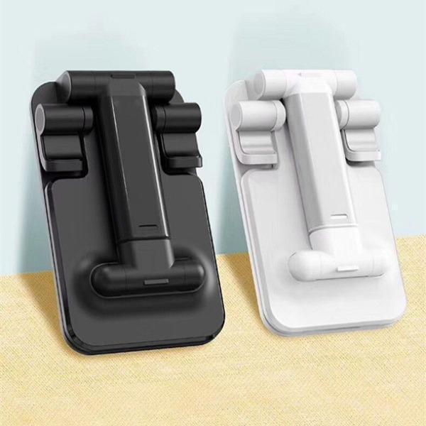 "Multifunktionell ställbar surfplattahållare i vit, svart, rosa på skrivbord. Hållbar och stilren, justerbar vinkel."