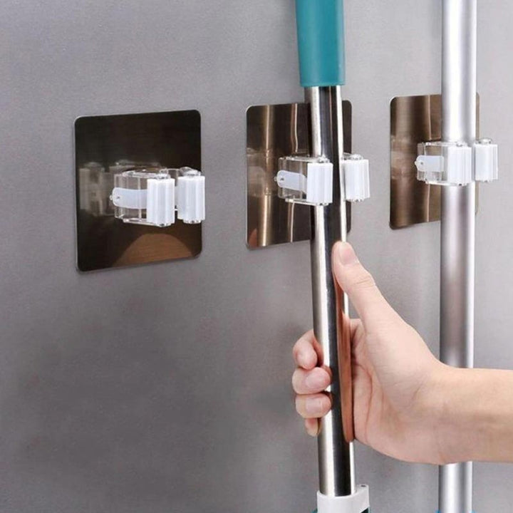 Multifunktionella självhäftande väggkrokar i vit design, perfekta för kök och badrum. Vattentåliga, hållbara och stabila.