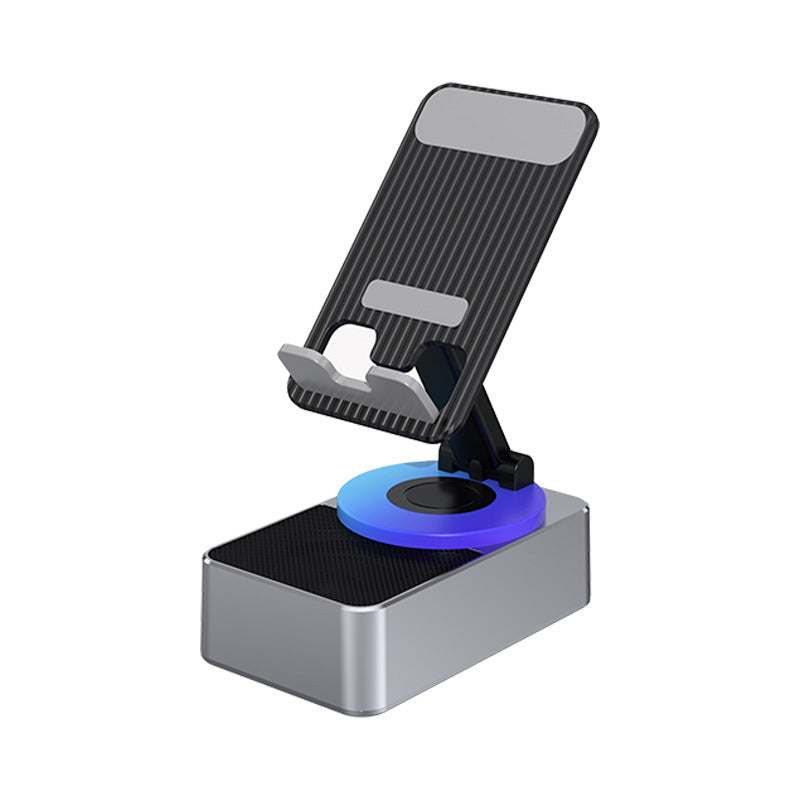 "Multifunktionellt telefonställ med Bluetooth-högtalare och powerbank, svart design med bärbar och halkfri bas."