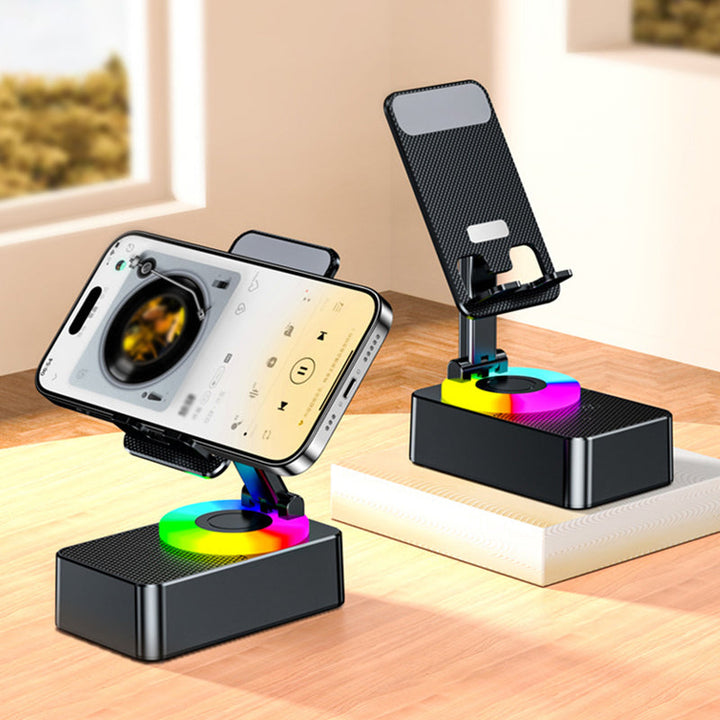 "Multifunktionellt telefonställ med Bluetooth-högtalare och powerbank, svart design med bärbar och halkfri bas."