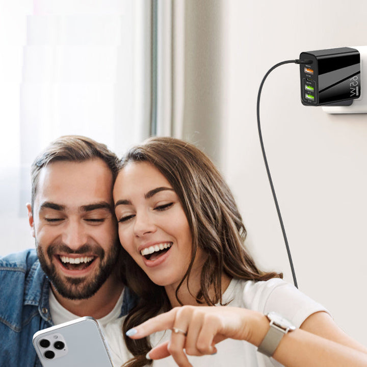 "Multiportadapter 65W snabbladdare, kompakt design, flera USB-portar, laddar flera enheter snabbt och effektivt."