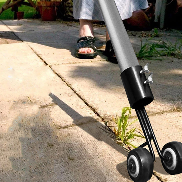 "Ogräsrensare för enkel trädgårdsskötsel, svart stål, ergonomisk handtag, perfekt för uppfart och uteplats."