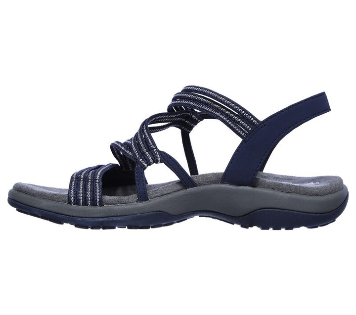 "Ortopediska slip-on damsandaler med justerbara remmar, stödjande fotvalv och anatomisk fotbädd i elegant design."