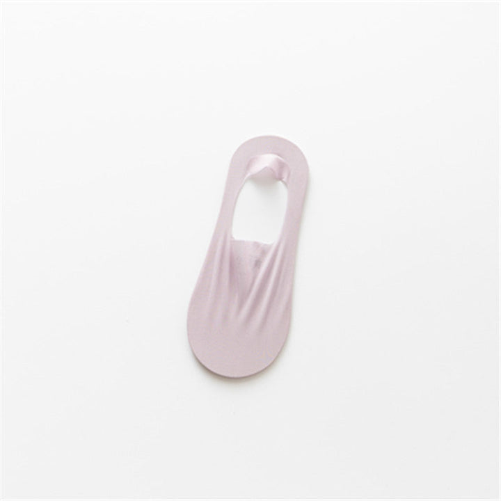 "Osynliga issilkesstrumpor med silikongrepp, osynlig design, i olika färger för maximal komfort och stil."