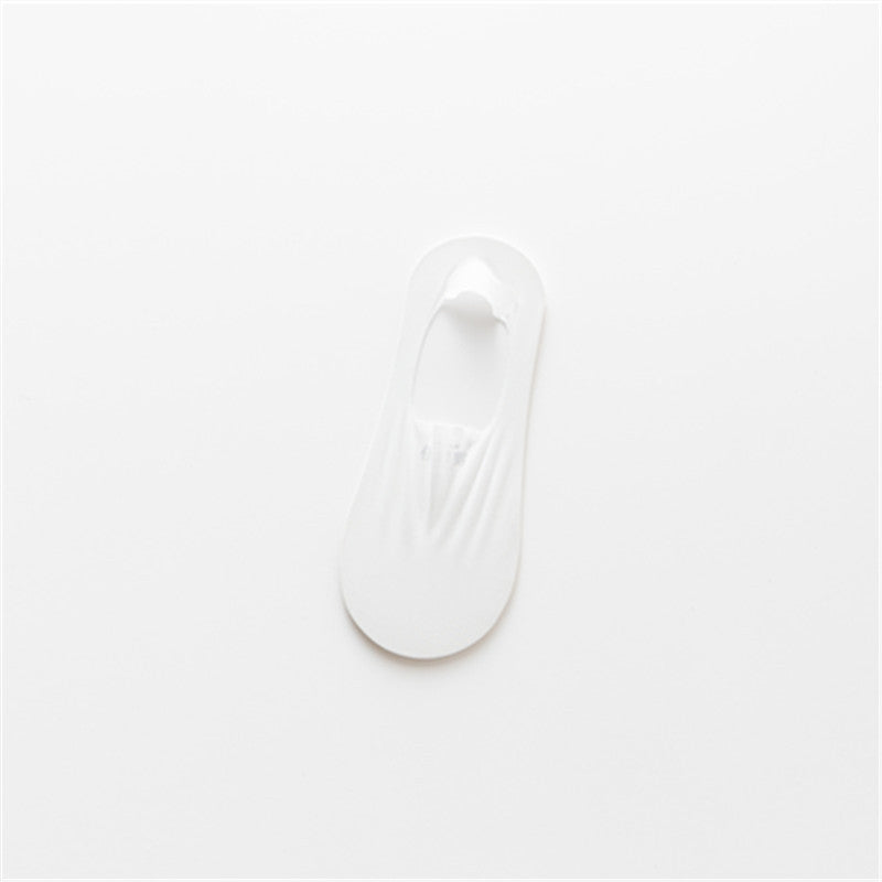 "Osynliga issilkesstrumpor med silikongrepp, osynlig design, i olika färger för maximal komfort och stil."