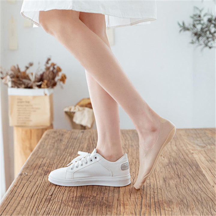 "Osynliga issilkesstrumpor med silikongrepp, osynlig design, i olika färger för maximal komfort och stil."