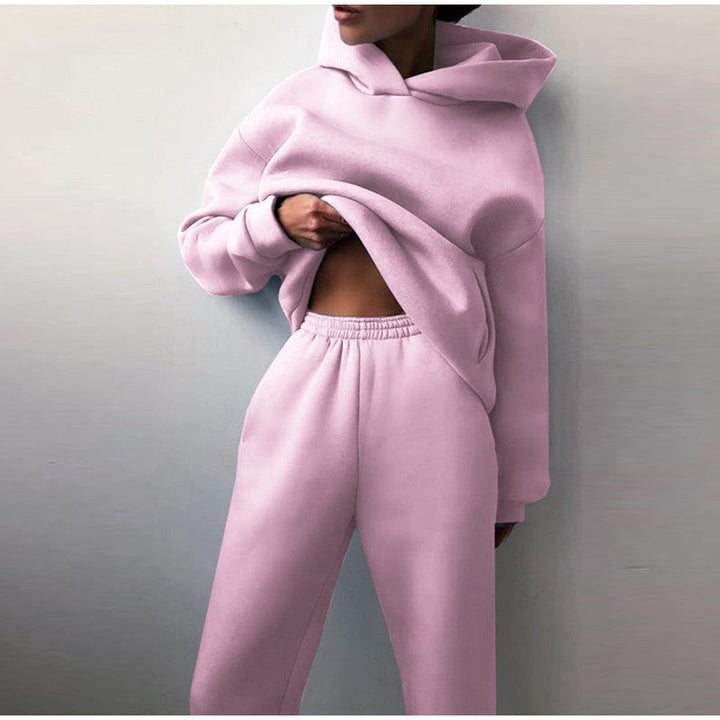 "Oversized beige damträningsdress med high waist byxa och hoodie, idealisk för stil och komfort under träning och avslappning