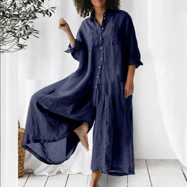"Oversized jumpsuit i bomull och linne med knappslå framtill och vida ben, chic och avslappnad stil för kvinnor."