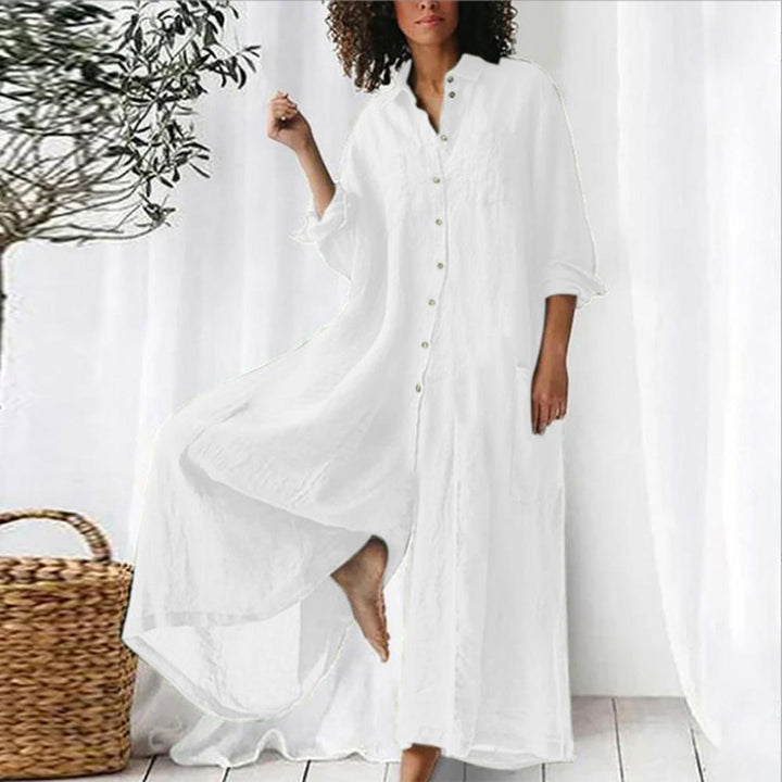 "Oversized jumpsuit i bomull och linne med knappslå framtill och vida ben, chic och avslappnad stil för kvinnor."