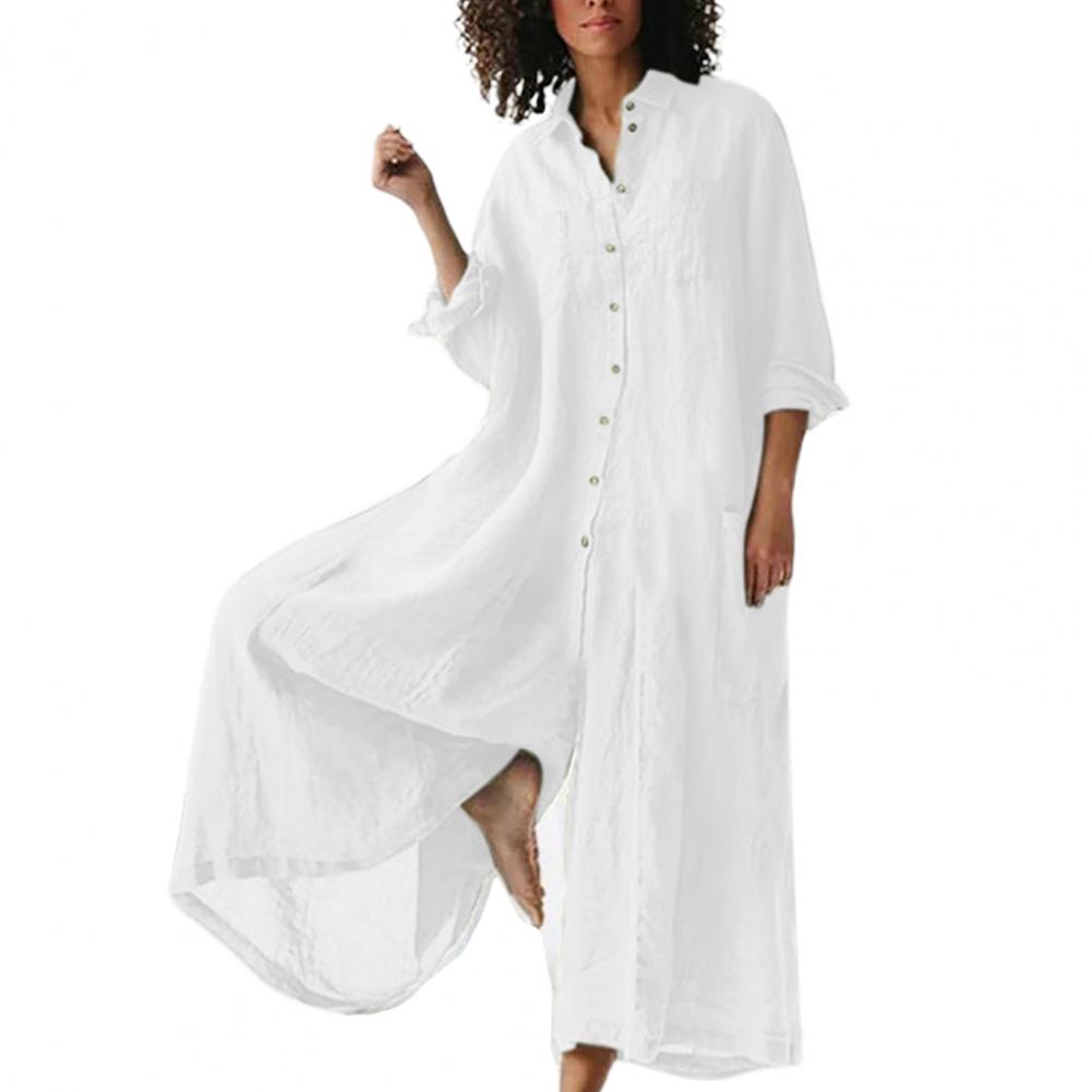 "Oversized jumpsuit i bomull och linne med knappslå framtill och vida ben, chic och avslappnad stil för kvinnor."