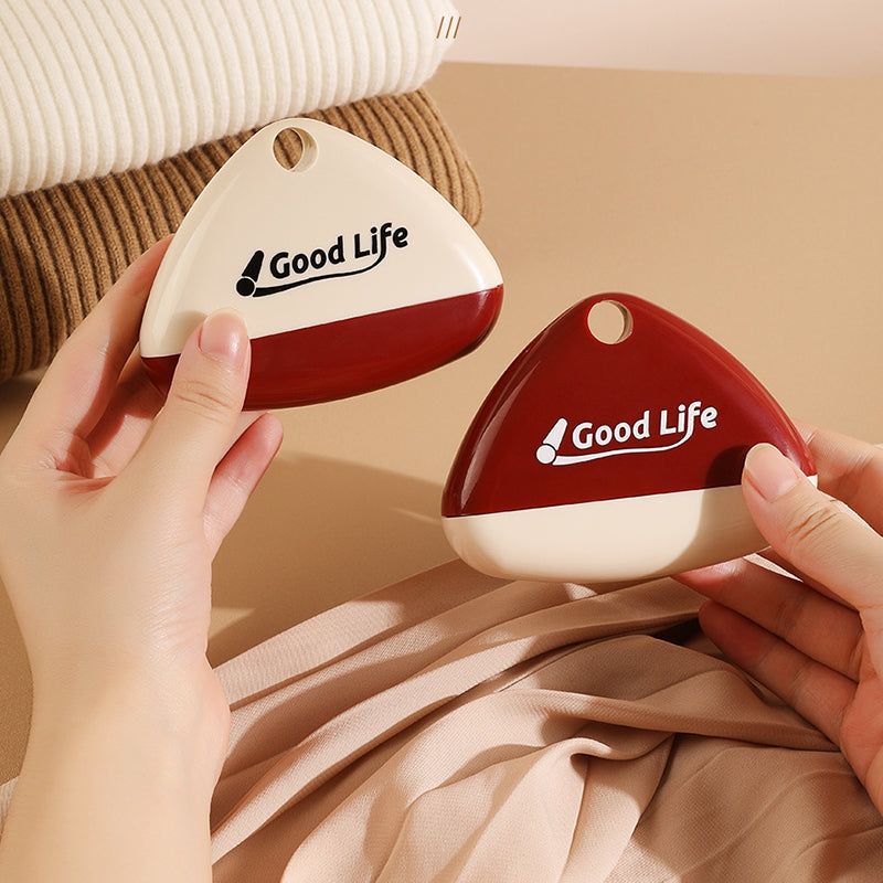 "Portabel tvättbar luddroller för hushållsbruk, vit+röd, elegant design, tar bort damm och djurhår enkelt."