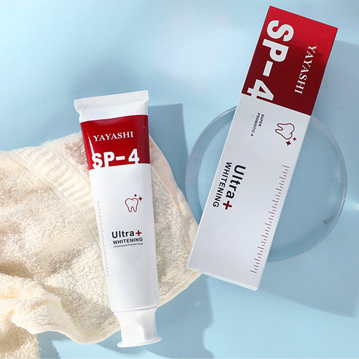 "Probiotisk tandkräm i vit tub, främjar blekning och tandhälsa, effektiv mot plack och ger fräsch andedräkt."