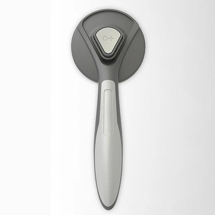 "Professionell husdjursvårdskam med stålborst, ergonomiskt grepp och rundade kanter för säker pälsvård av hundar och katter."